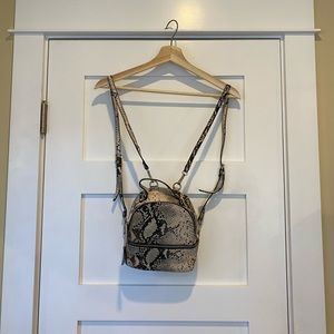 Steve Madden mini snakeskin backpack
